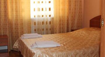 Семейный номер с балконом в Гостинице Гостевой дом Олива